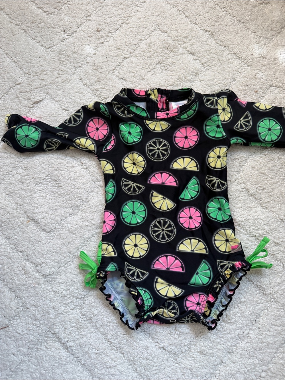 Ruffle Butts Black One-Piece Swimsuit with Pink, Green & Yellow Citrus Print